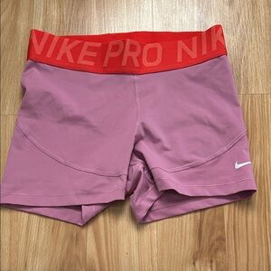 Nike Women's Athletic Shorts in Pink and Red